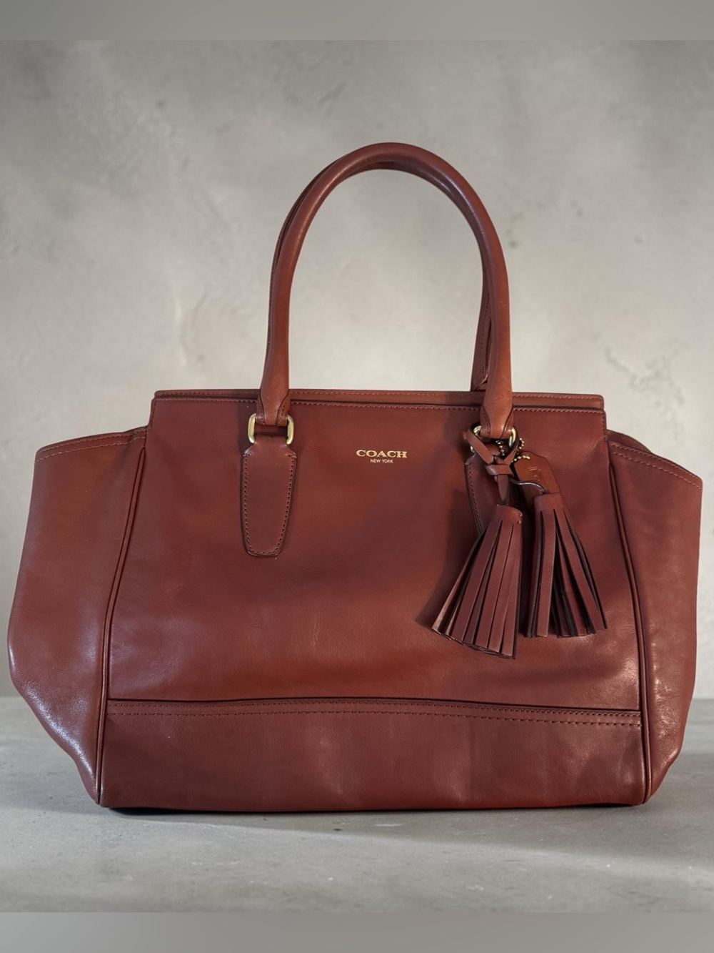 Coach Leather Saddle Brown Tote Bag with Tassels & Zip Pocket